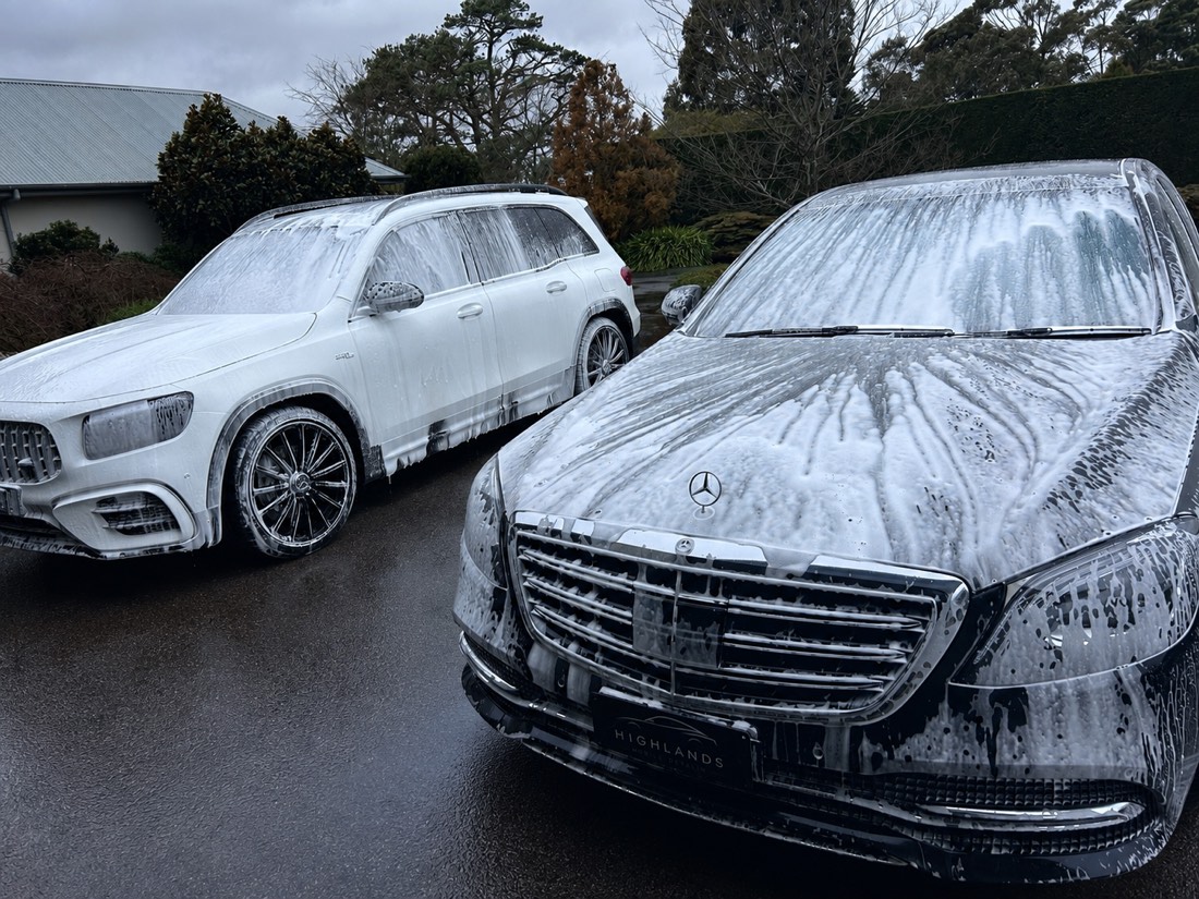 Two Mercedes-Benz vehicles mid snow-foam wash, Southern Highlands