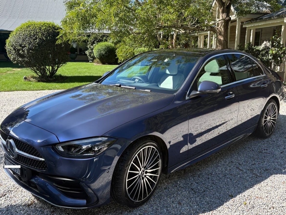 Detailed navy Mercedes-Benz C-Class exterior