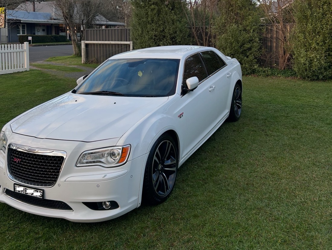 Detailed white Chrysler 300 SRT exterior