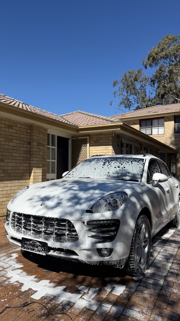 Porsche front grille mid snow-foam wash