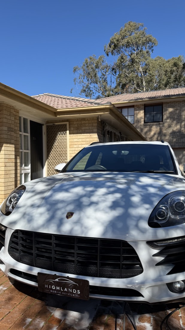 Porsche SUV mid snow-foam wash